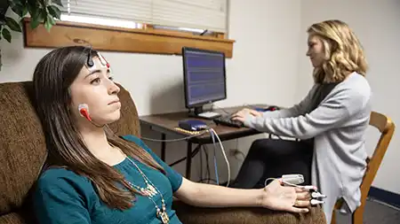 Patient hooked up to electronic monitoring.