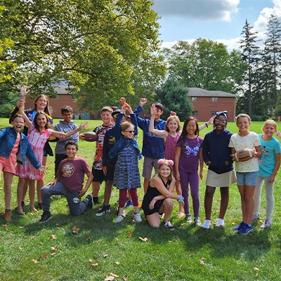 Group of middle school students playing outside.