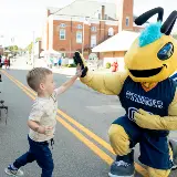 StingerwithyoungchildduringSidewalkSaturdaysinCedarvilleOhio