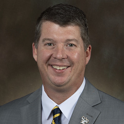 image of Chris Cross smiling