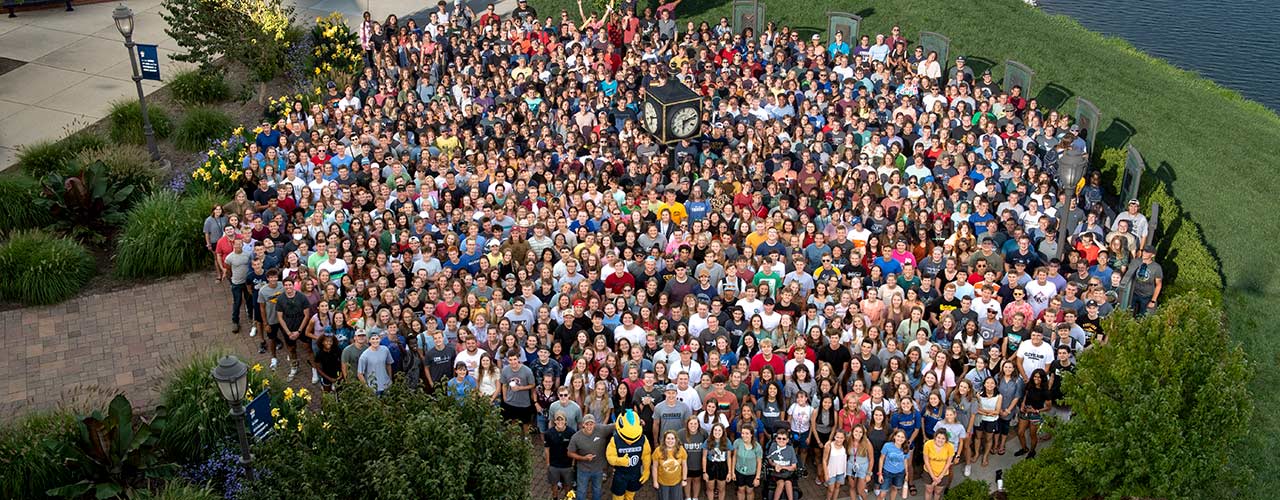 Class of 2025 gathered around the clock outside the SSC