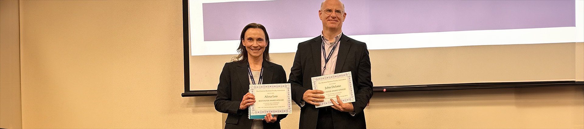 Dr. John Delano and Professor Alina Leo receive a Best Paper Award at the 2025 national conference of the Christian Business Faculty Association.