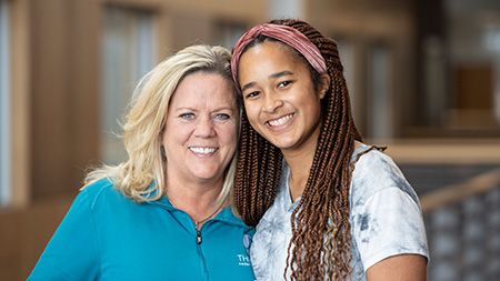 Student and a Cove instructor smiling