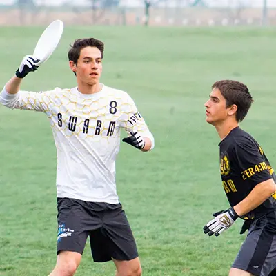 Two guys playing ultimate frisbee