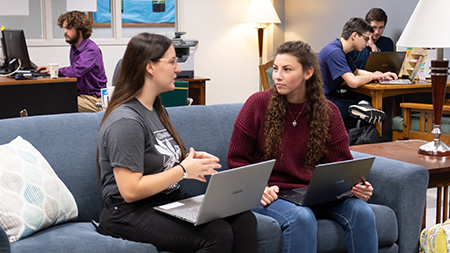 Students tutoring in the writing center