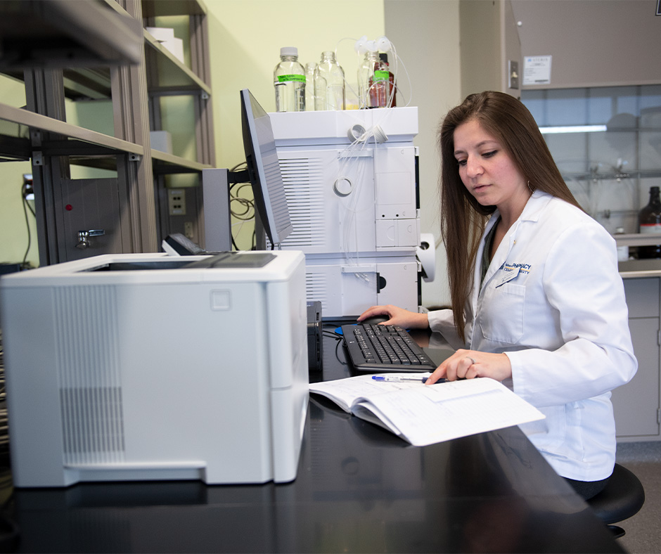 Pharmacy graduate student in the lab.
