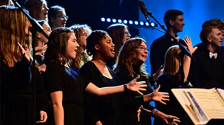 Group of singers in Concert Chorale performing